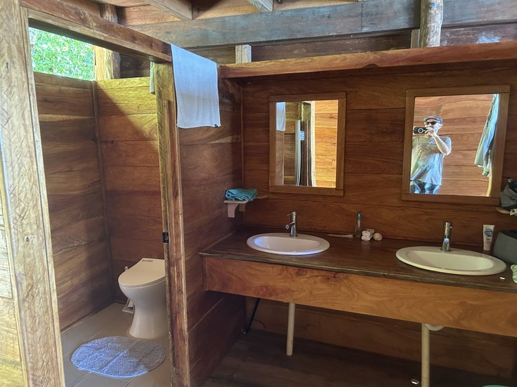 Shared dual entry bathroom
